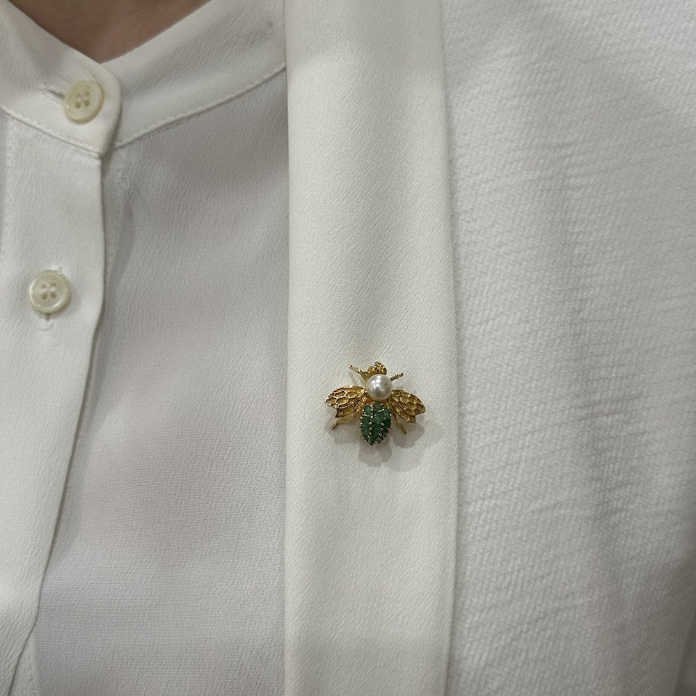 Broche "Abeille" Or jaune 18k avec Emeraudes et Perle de culture 1990. - Castafiore