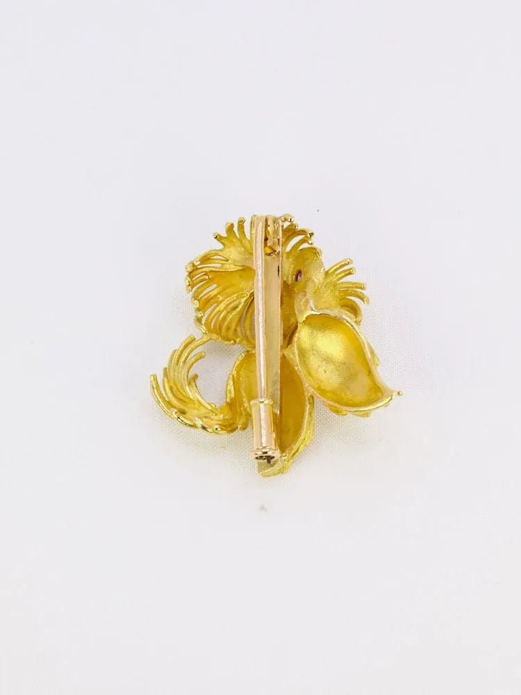 Broche animalière chien or jaune rubis - Castafiore