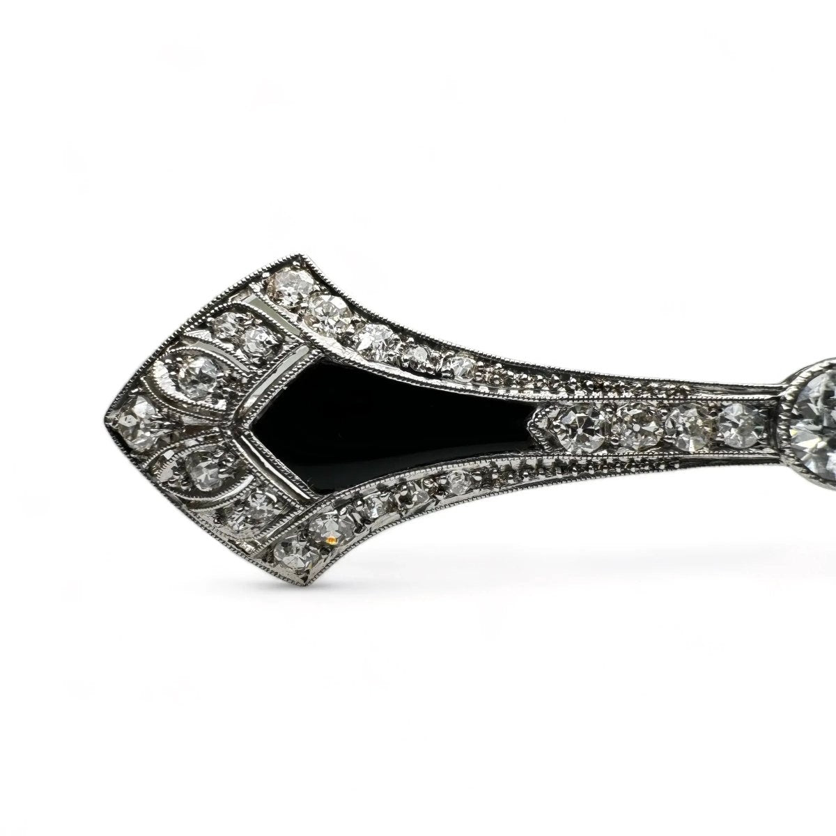 Broche barrette Art - Déco en platine, diamants et onyx. - Castafiore