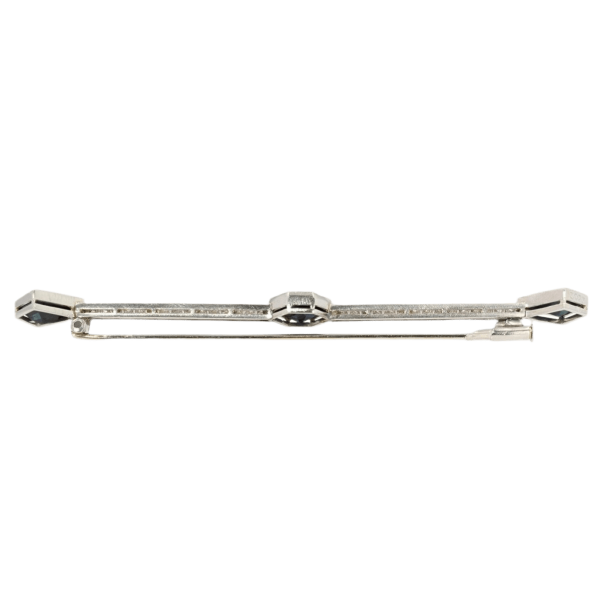 Broche Barrette en or blanc, platine, saphirs et diamants - Castafiore