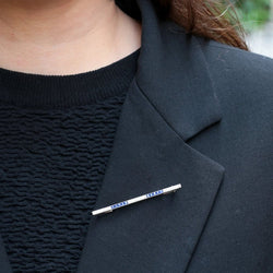 Broche barrette en platine, saphirs et diamants - Castafiore