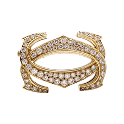 Broche CARTIER "Double C" en or jaune et diamants - Castafiore
