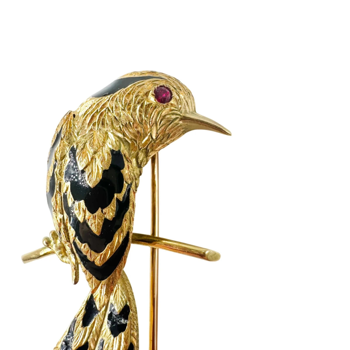 Broche CARTIER "Oiseau sur une branche" en or jaune, émail et rubis - Castafiore