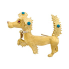 Broche Clip Bestiaire en or jaune, or blanc, rubis et turquoise - Castafiore