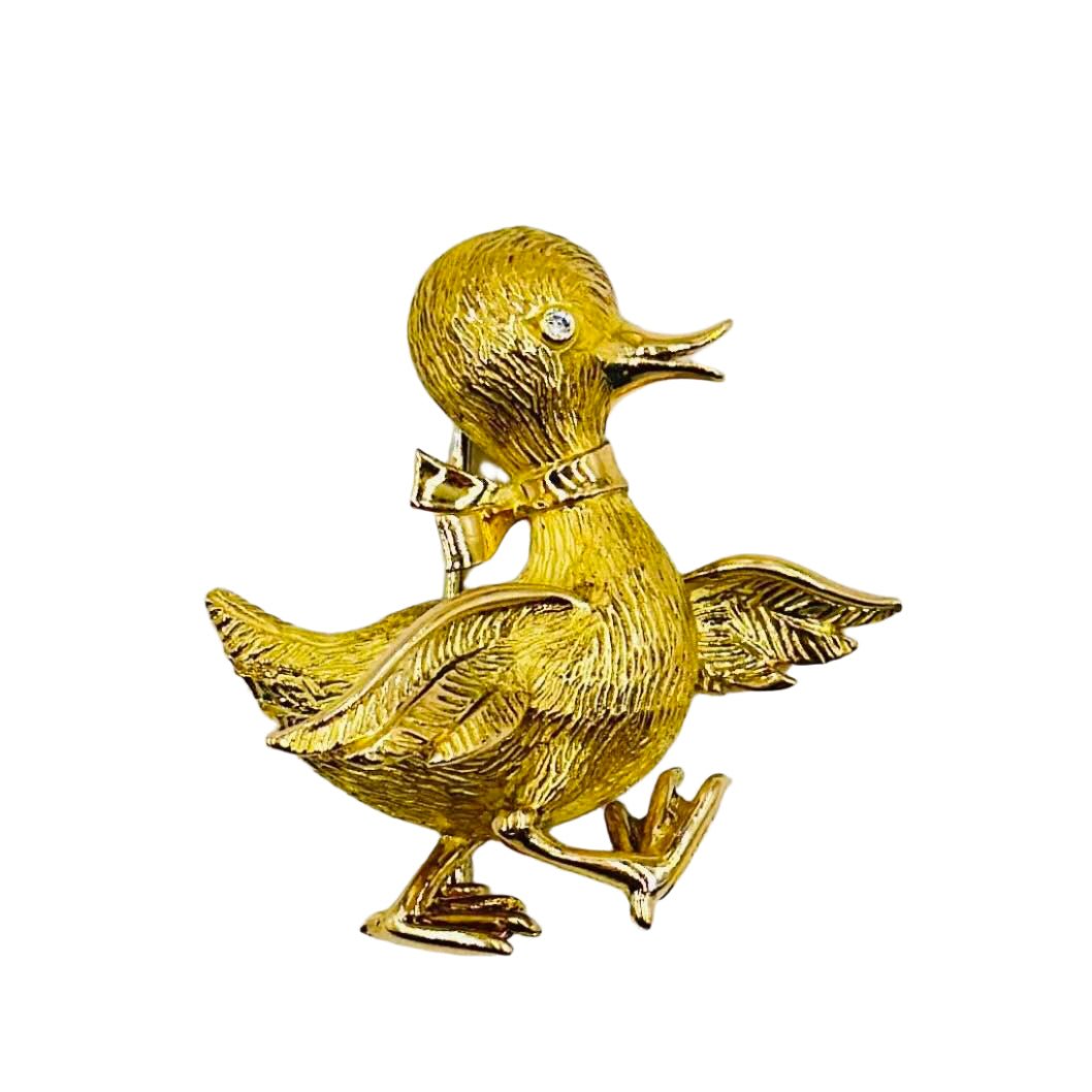 Broche Clip BOUCHERON "Canard marchant" en or jaune et diamant - Castafiore