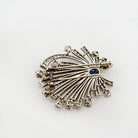 Broche Clip en or blanc, platine, saphir et diamants - Castafiore