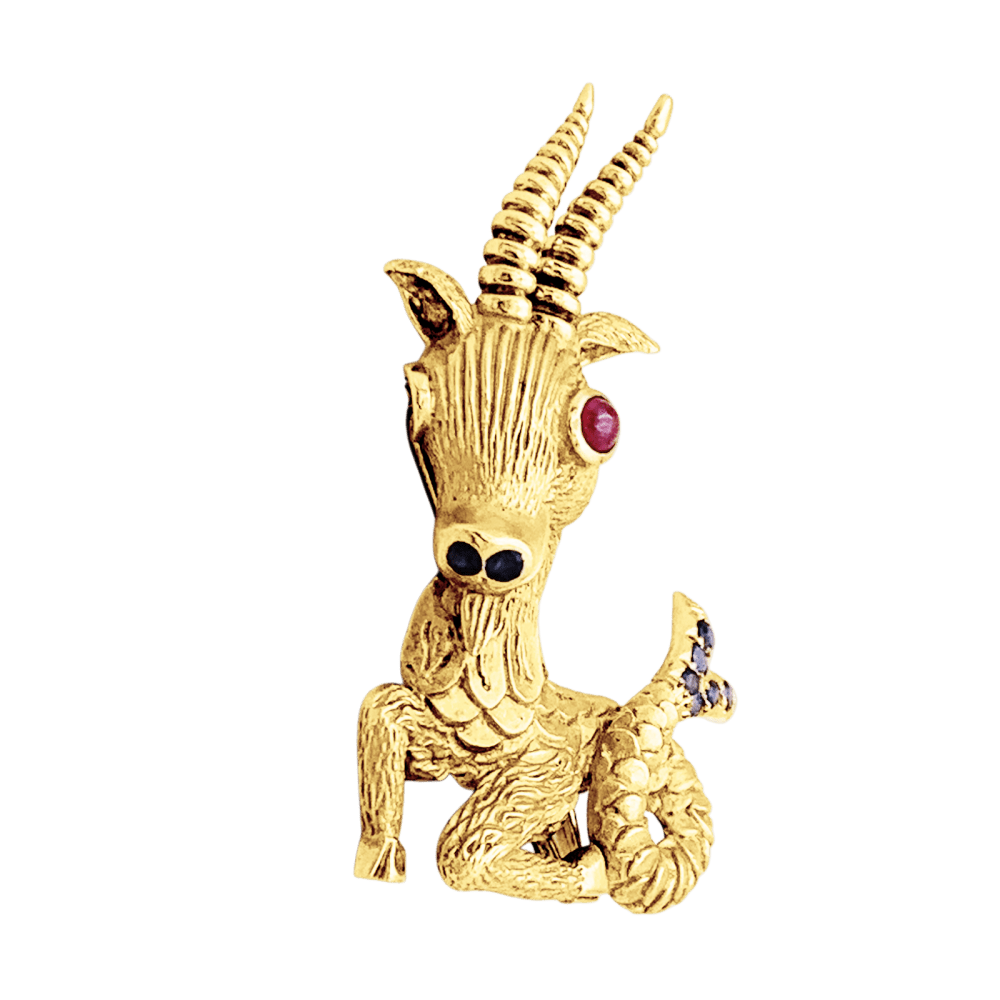 Broche Clip en or jaune, rubis et saphirs - Castafiore