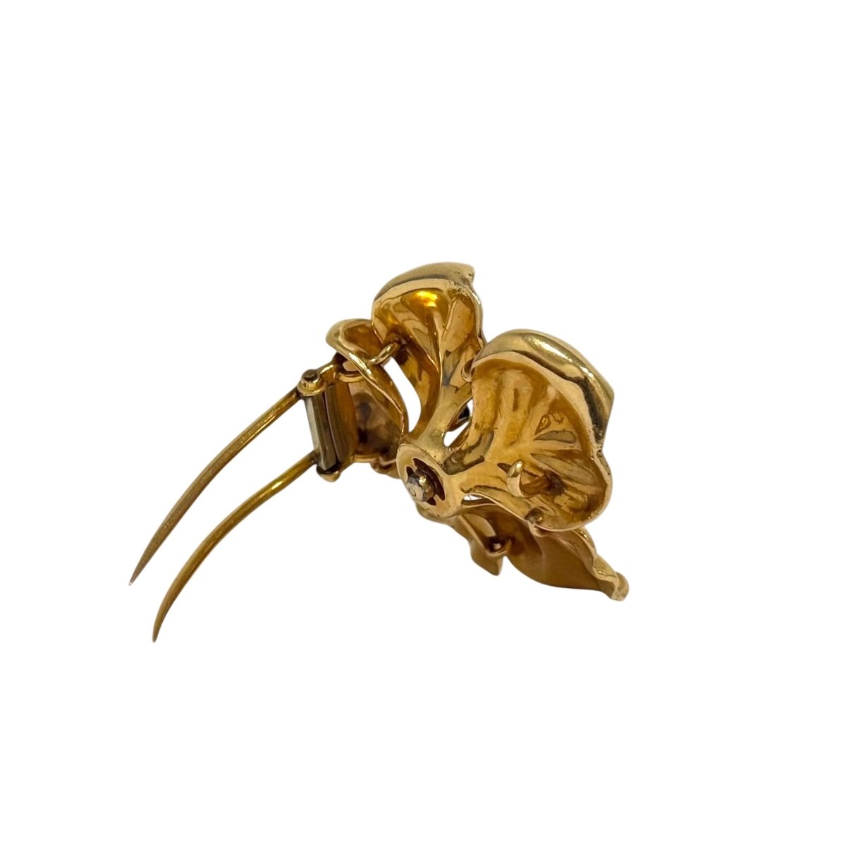 Broche Clip en or jaune, saphirs et diamants - Castafiore