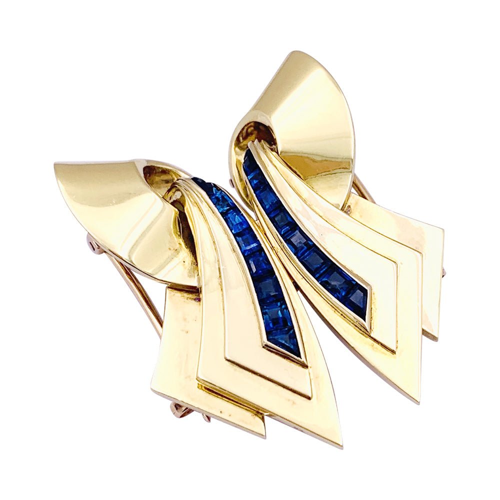 Broche Clip en or rose et pierres bleues. - Castafiore