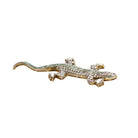 Broche Clip Lézard en argent er or jaune, émeraudes et diamants - Castafiore