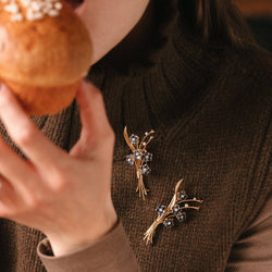 Broche Clip VAN CLEEF & ARPELS "Bouquet de fleurs" en or jaune et saphirs - Castafiore