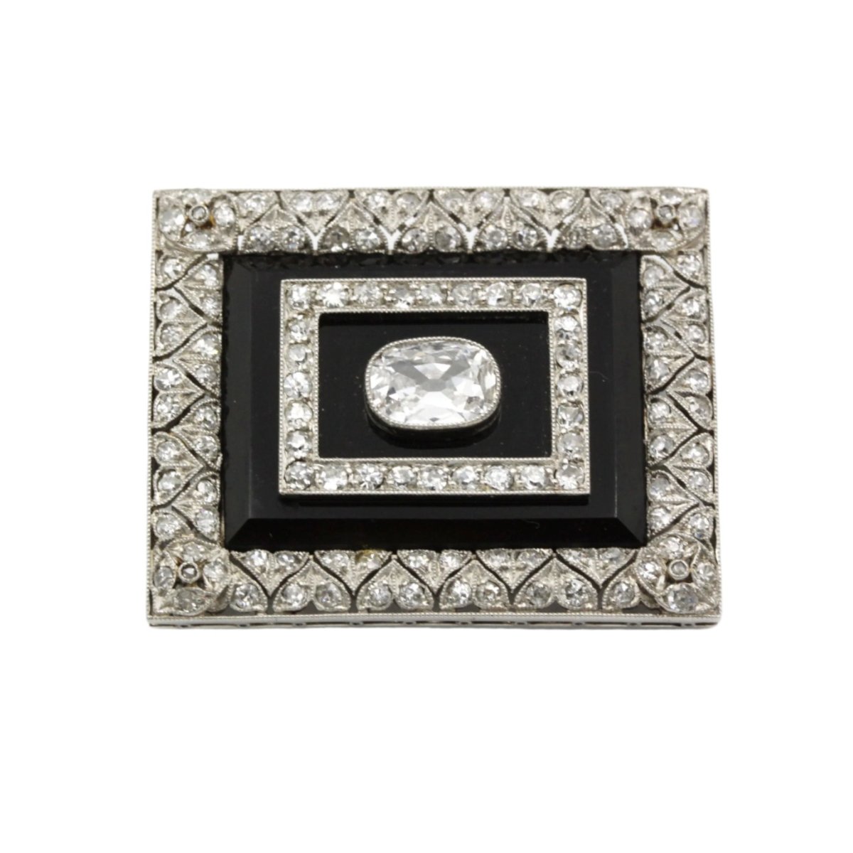 Broche en or blanc, platine, onyx et diamant - Castafiore