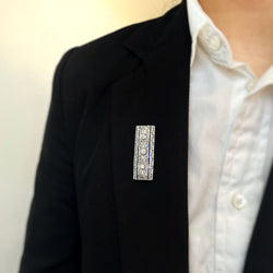 Broche en or blanc, platine, saphirs et diamants - Castafiore