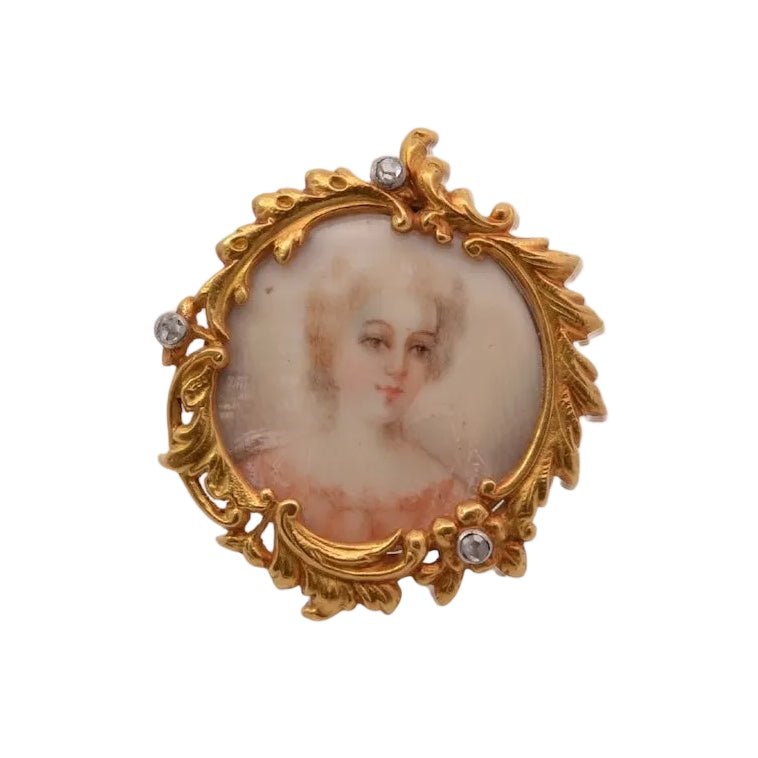 Broche en or jaune et diamants - Castafiore
