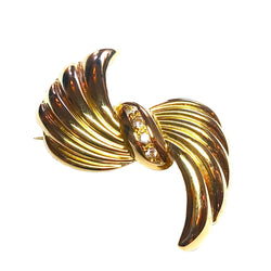 Broche en or jaune et diamants - Castafiore