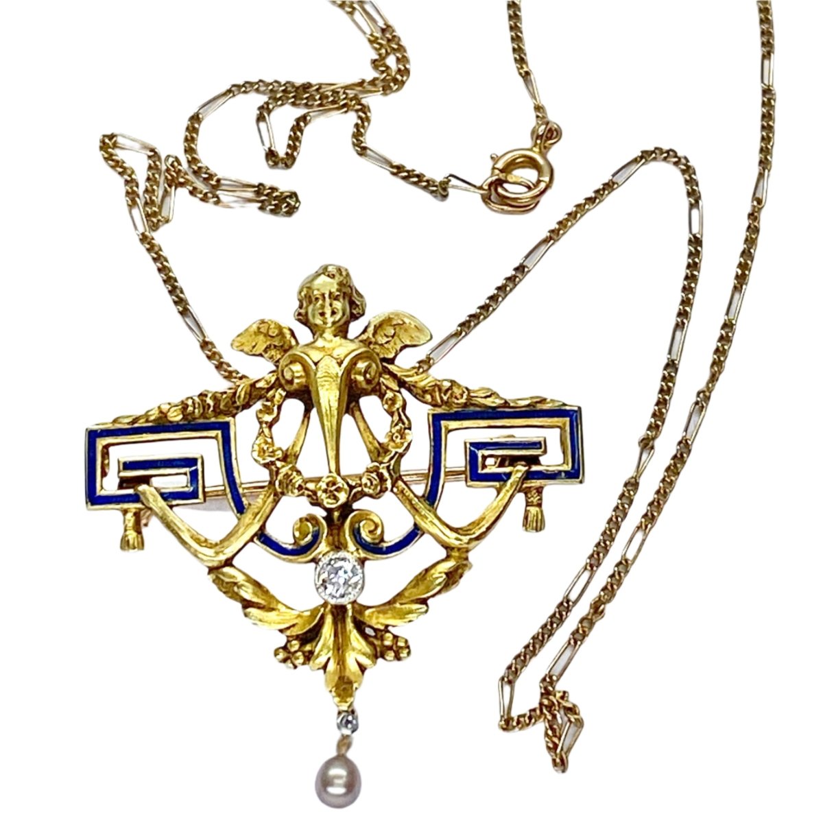 Broche en or jaune, perle et diamant - Castafiore