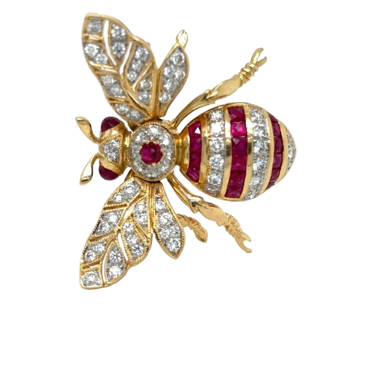 Broche en or jaune, rubis et diamants - Castafiore