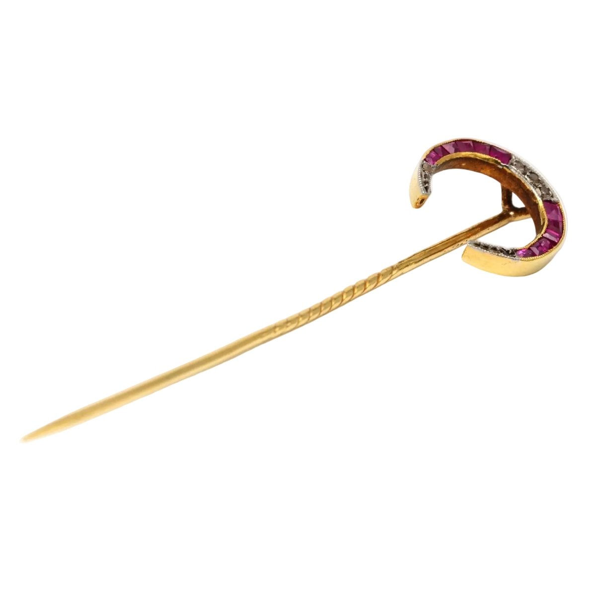 Broche en or jaune, rubis et diamants - Castafiore