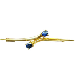 Broche en or jaune, saphirs et diamants - Castafiore