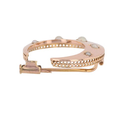 Broche en or rose et perles - Castafiore