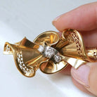 Broche en or rose, platine et diamants - Castafiore