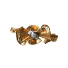 Broche en or rose, platine et diamants - Castafiore