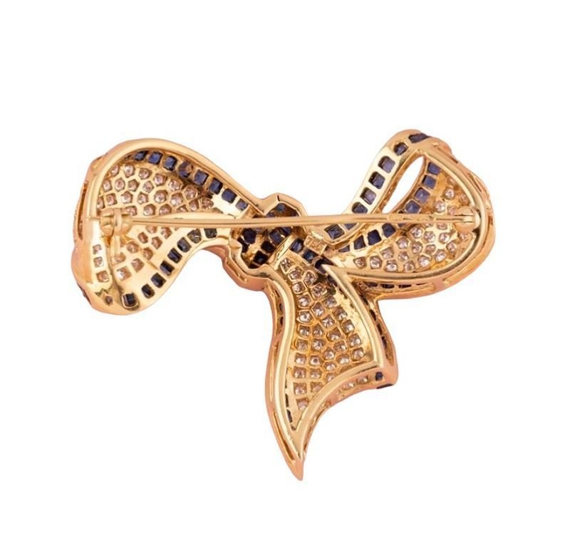 Broche Épingle composée d'or jaune, saphirs et diamants - Castafiore