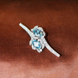 Broche Épingle en or blanc, aigues-marines et diamants - Castafiore
