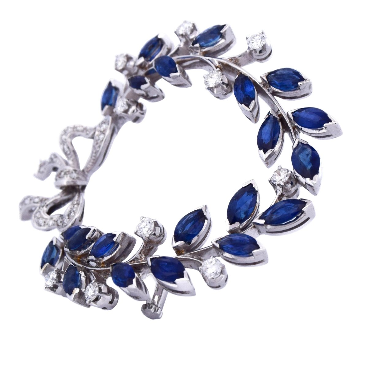 Broche Épingle en or blanc, saphirs et diamants - Castafiore