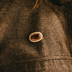 Broche Épingle en or jaune, topaze et perles - Castafiore