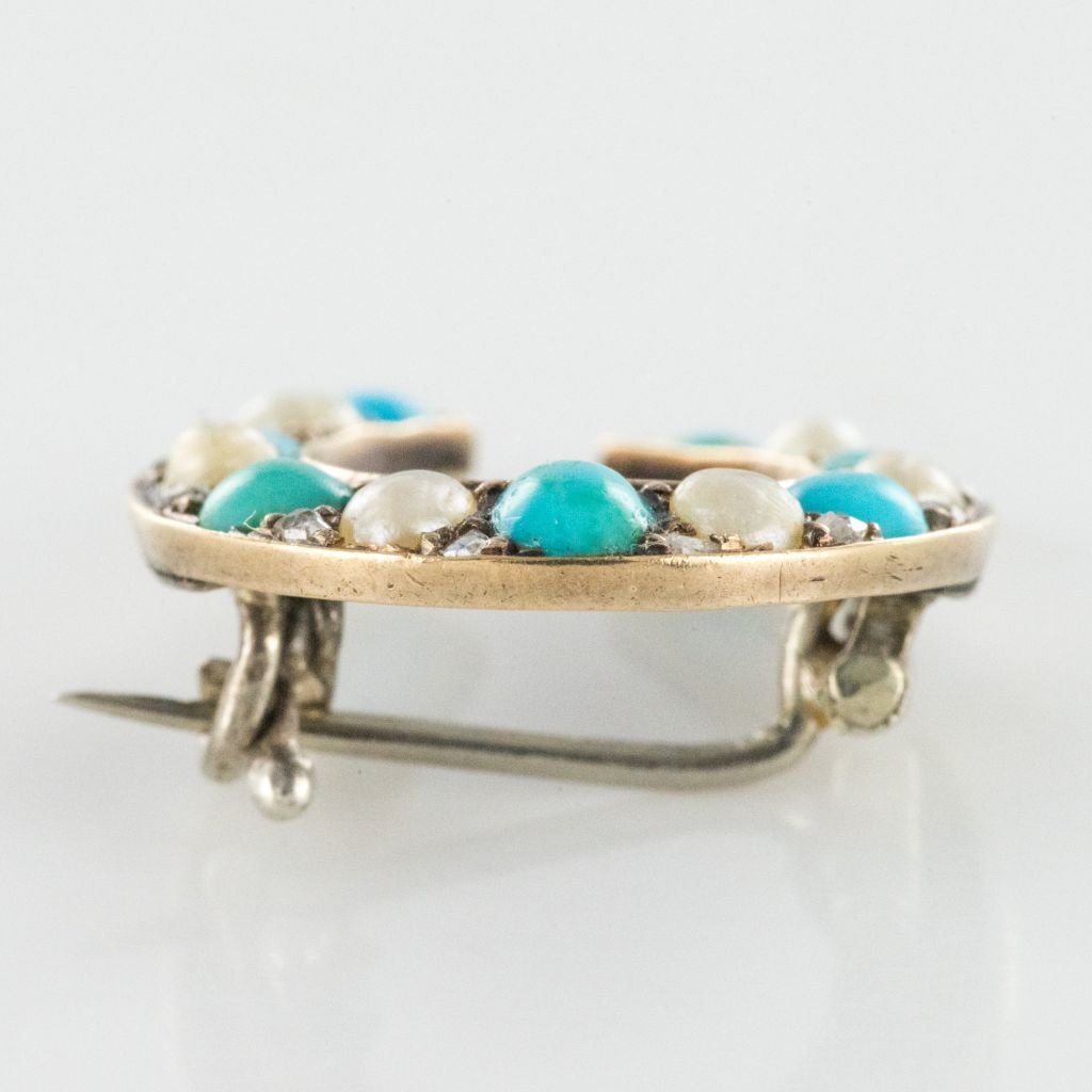Broche fer à cheval turquoises perles fines diamants - Castafiore