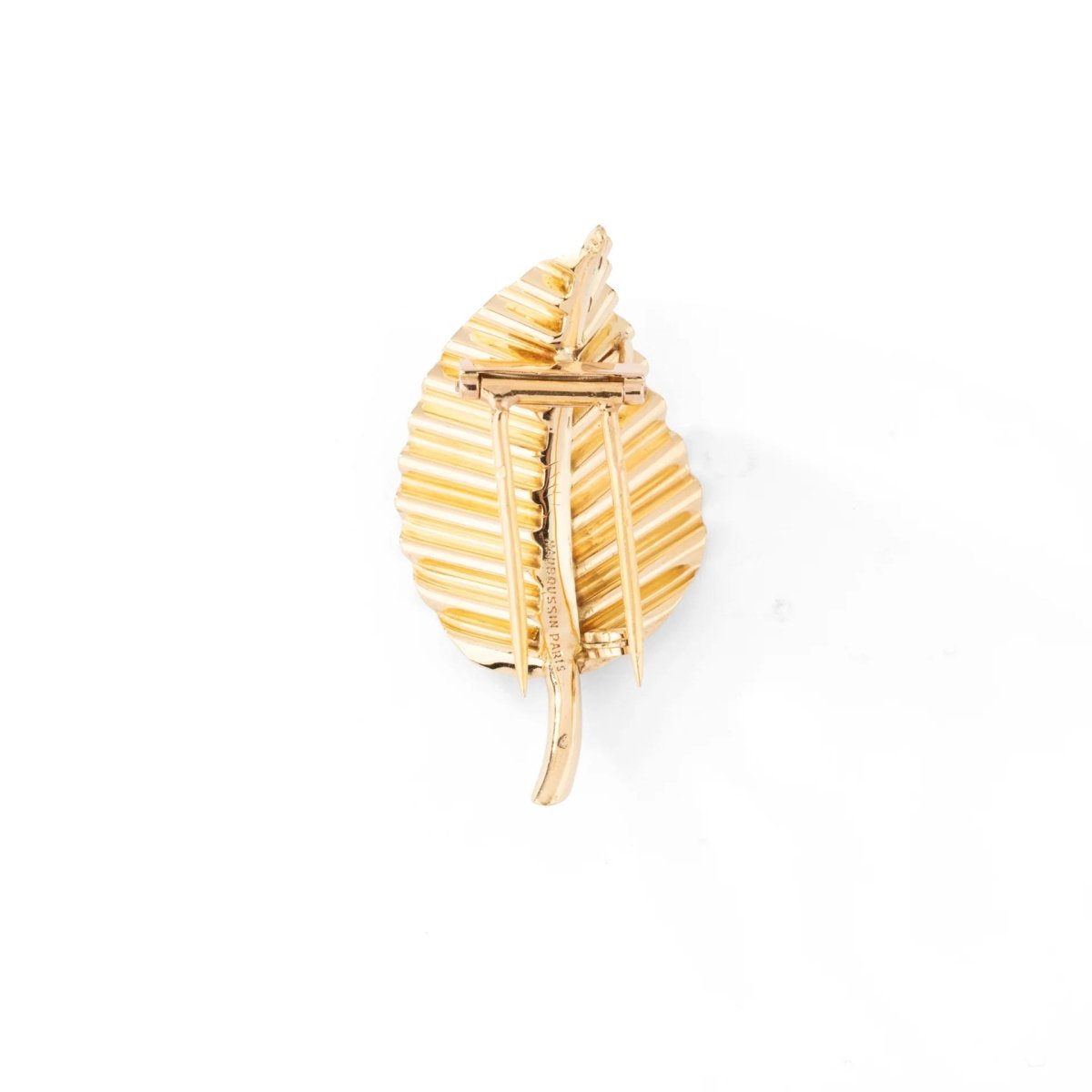 Broche feuille MAUBOUSSIN en or jaune. - Castafiore