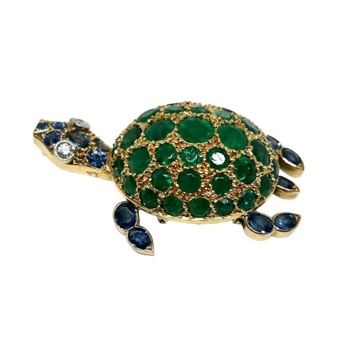 Broche GUBELIN en or jaune, émeraudes, saphirs et diamants - Castafiore
