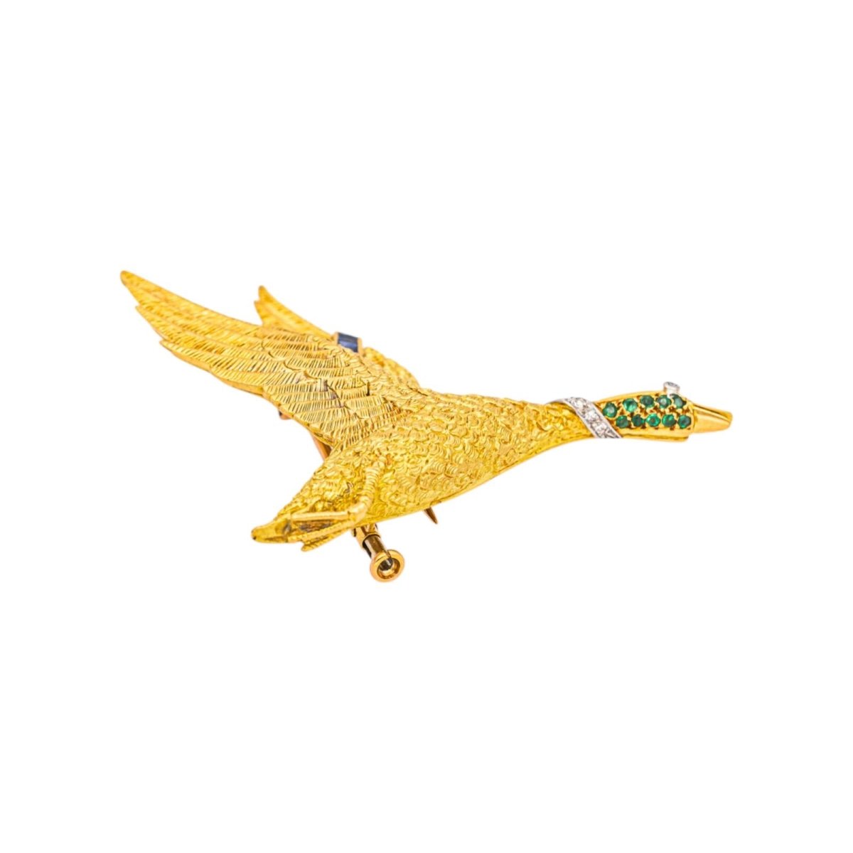 Broche HERMÈS "Oie Sauvage" en or jaune, or blanc, tsavorites, saphirs et diamants - Castafiore