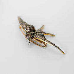 Broche "hirondelle" en or jaune et argent - Castafiore