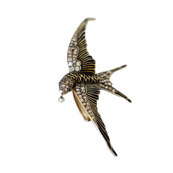 Broche "hirondelle" en or jaune et argent - Castafiore