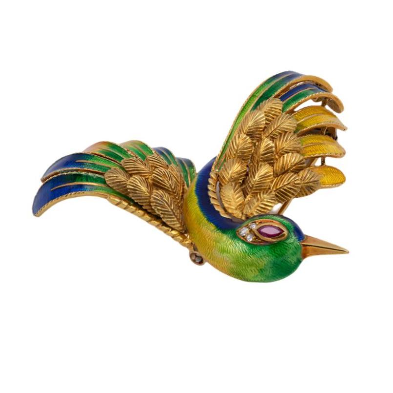 Broche MAUBOUSSIN oiseau en or jaune, rubis et diamant - Castafiore