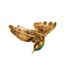 Broche MAUBOUSSIN oiseau en or jaune, rubis et diamant - Castafiore