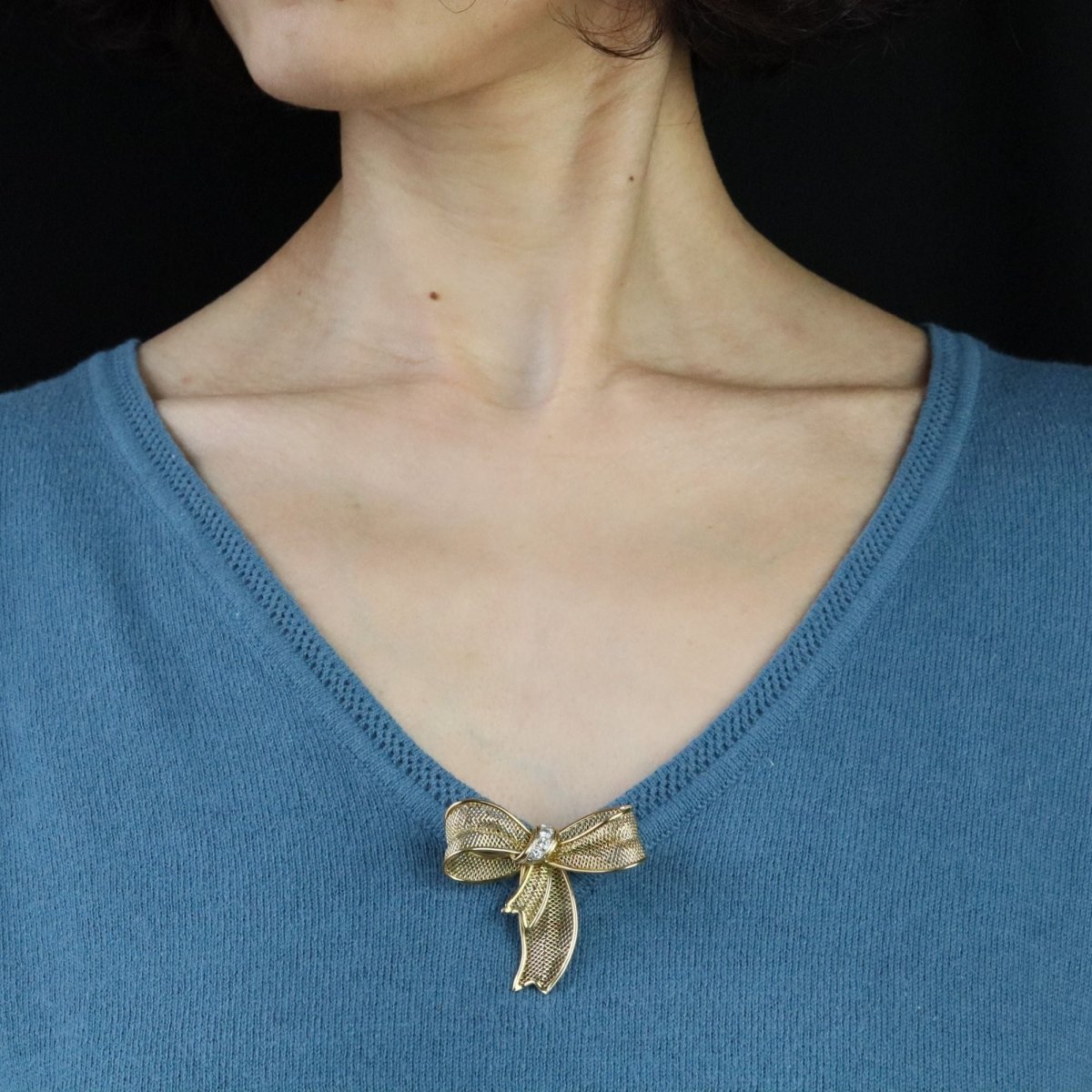 Broche noeud en or jaune et diamants - Castafiore