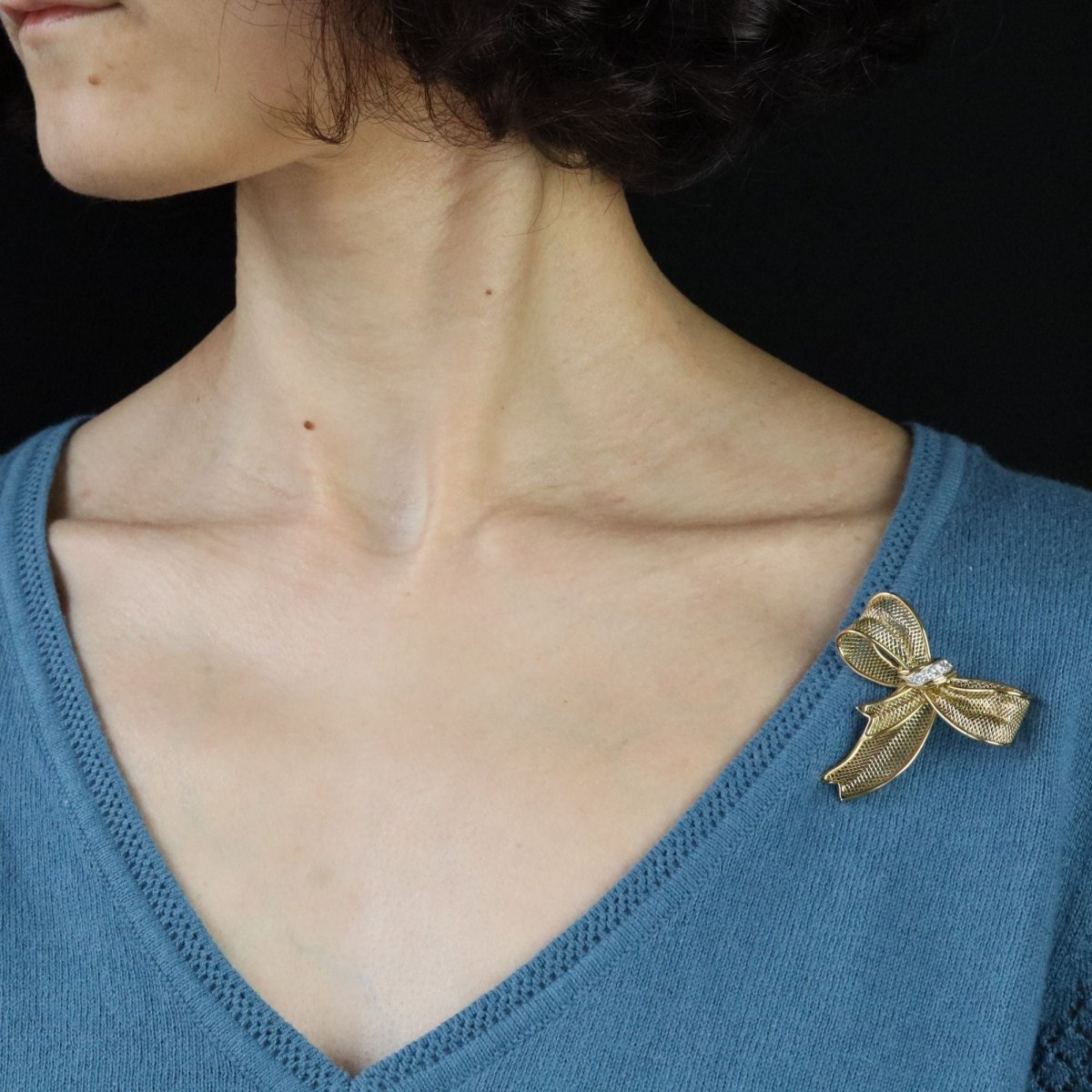 Broche noeud en or jaune et diamants - Castafiore