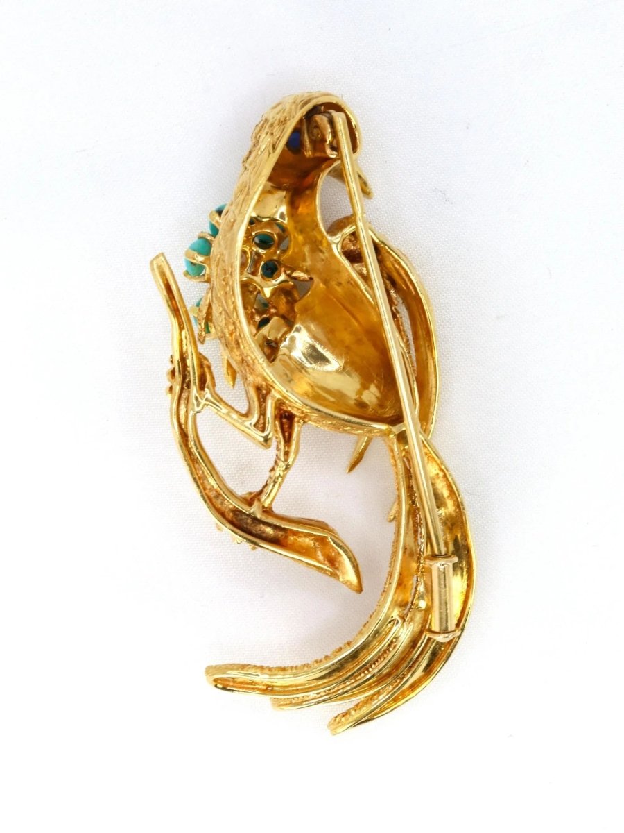 Broche oiseau en or jaune, saphir et diamant - Castafiore