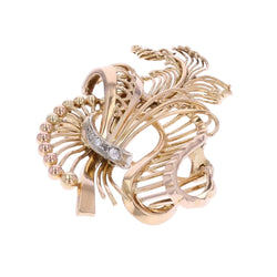 Broche or jaune et diamants vintage - Castafiore