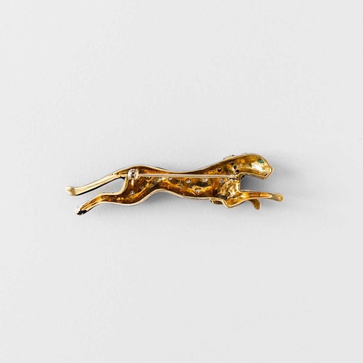 Broche panthère André VASSORT en or jaune et émail noir - Castafiore