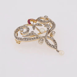 Broche pendentif Art Nouveau en or jaune et platine avec diamants, perles fines et rubis - Castafiore
