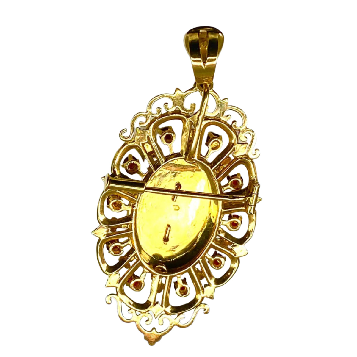 Broche pendentif en or jaune 18 carats en grenats, émeraude et diamants - Castafiore