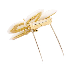 Broche Van Cleef & Arpels "Rose de Noël" or jaune, corail blanc, diamants. - Castafiore