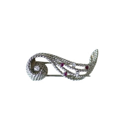 Broche volute diamants et rubis - Castafiore