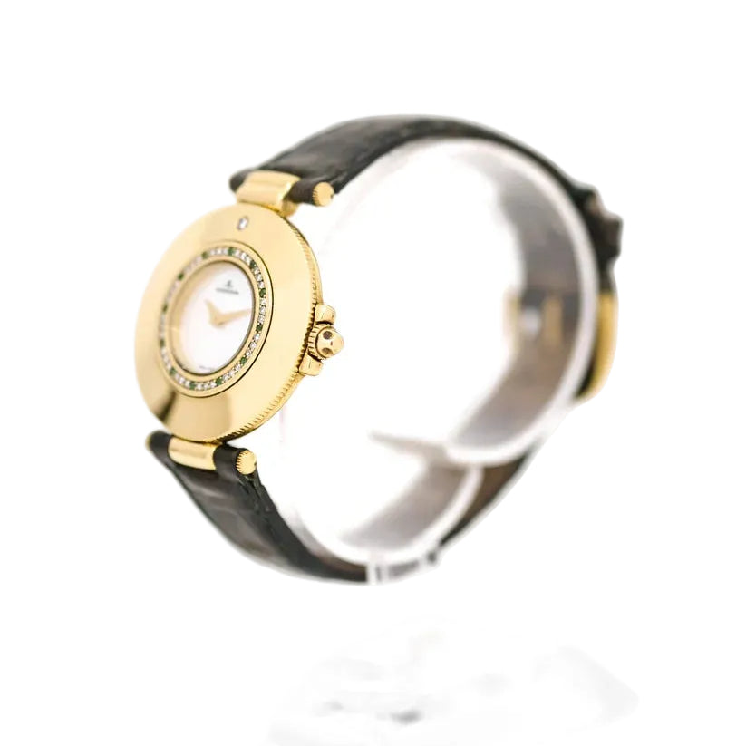 Montre JAEGER-LECOULTRE en or jaune, nacre, cuir, émeraudes et diamants