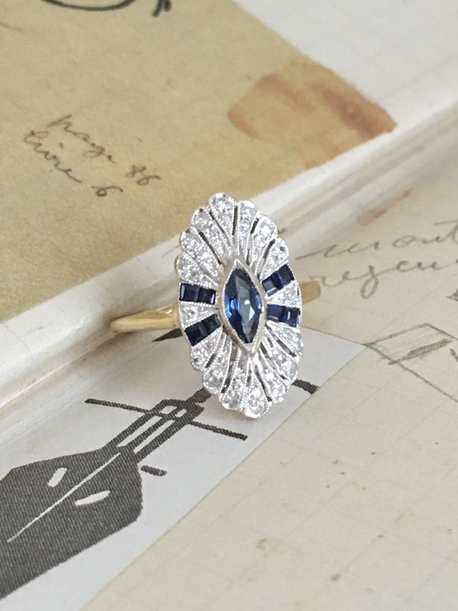 Bague Entourage en or jaune, platine, saphir et diamants