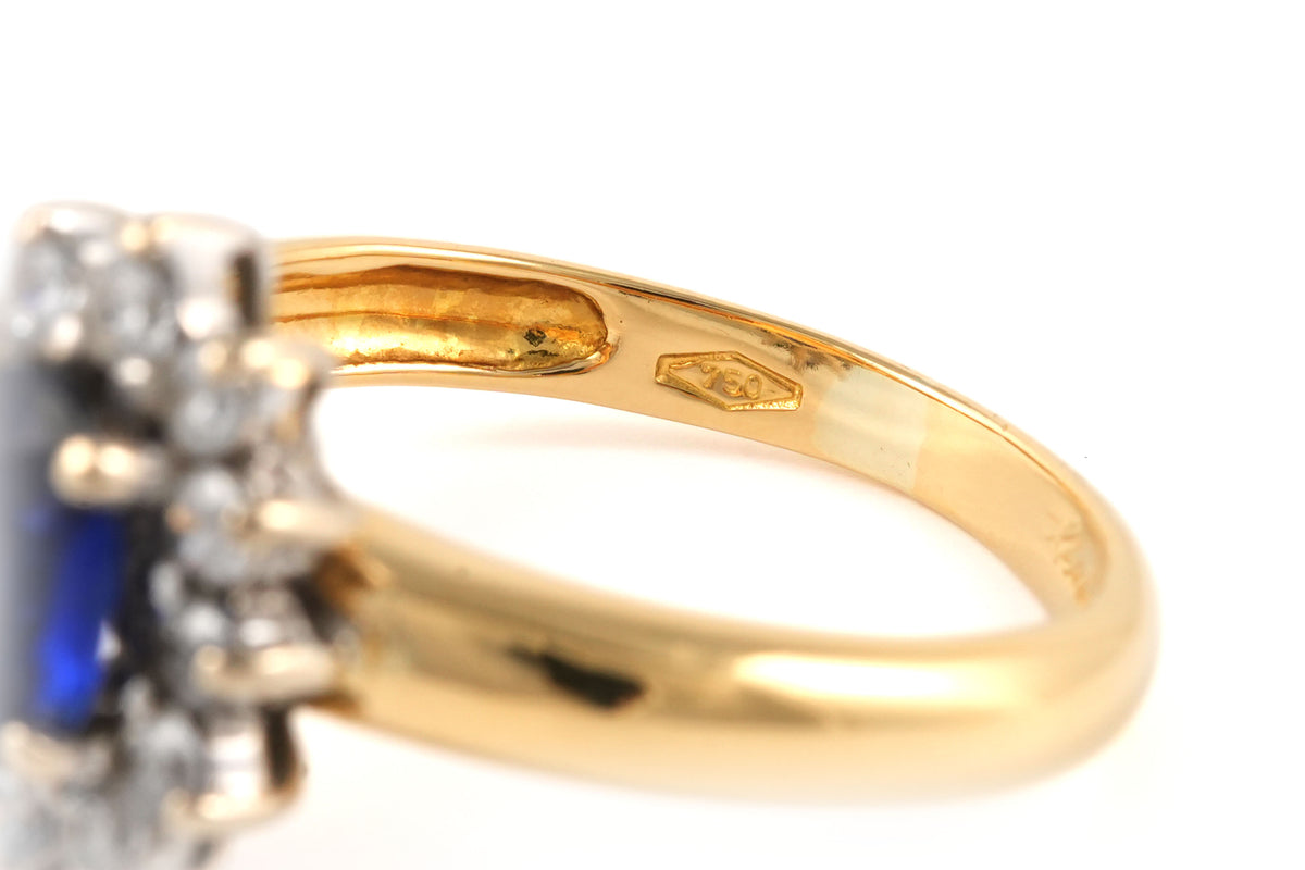 Bague Marguerite en or jaune, saphir et zirconiums
